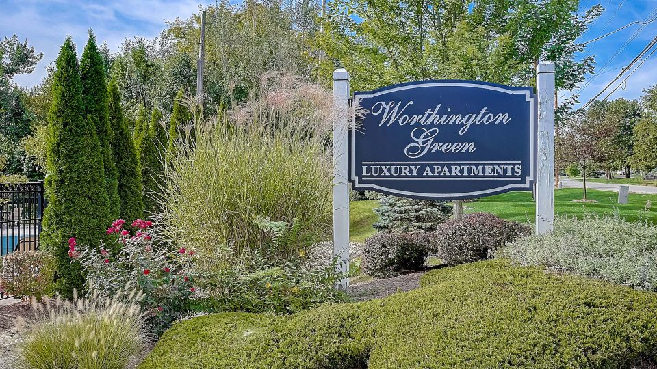 the sign for washington park apartments at The Worthington Green